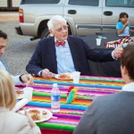 Paul Kutsche talks with table of community members